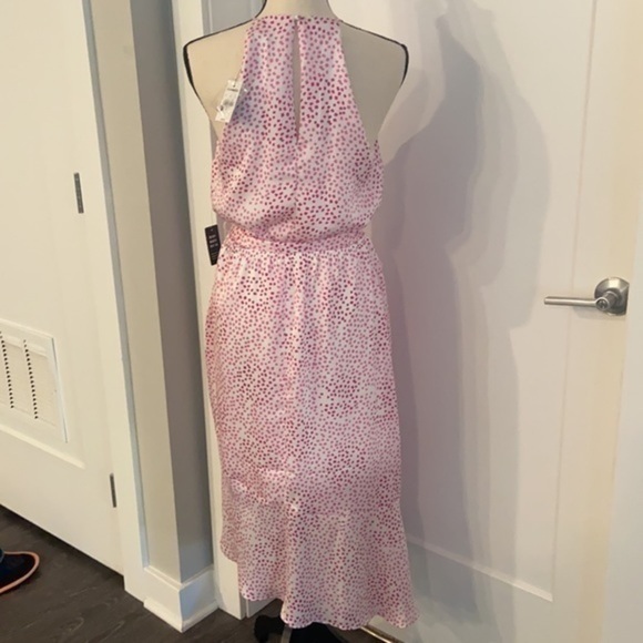 Dotted high neck, asymmetrical fit and flare dress - Picture 3 of 6